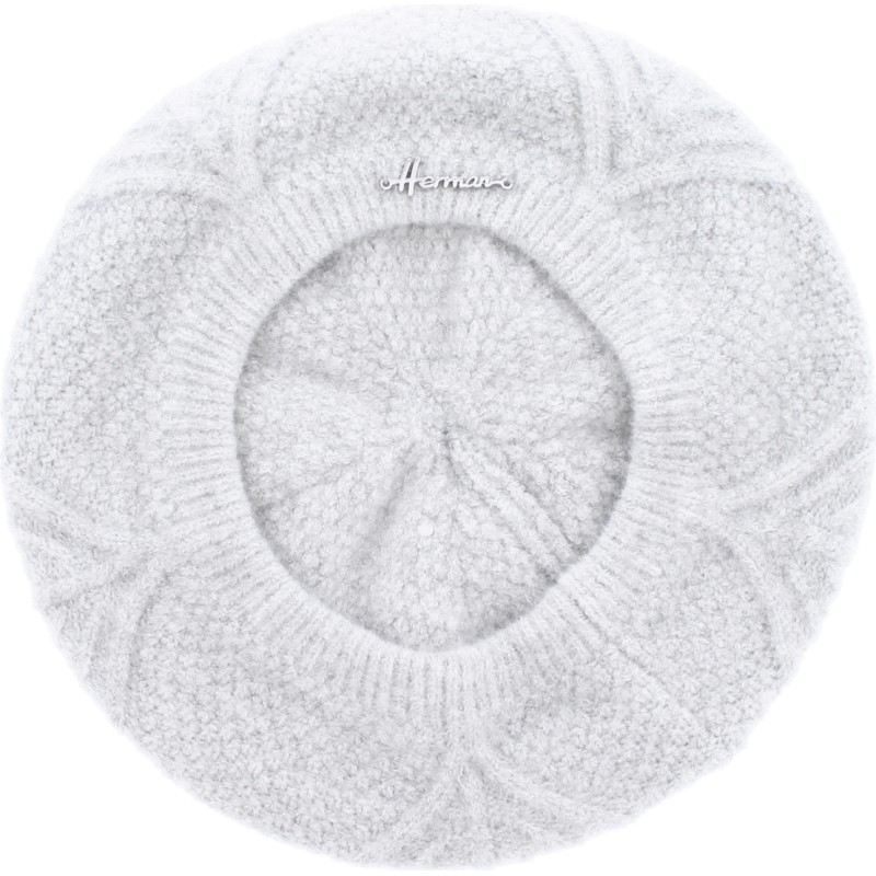 Women's beret in acrylic with a flower design on the top Women's beret in acrylic with a flower design on the top